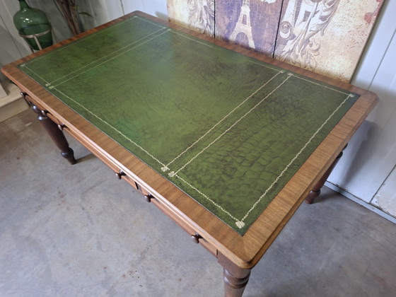 Image 1 of Antique English writing desk, desk with drawers and inlaid leather.

Dimensions 150x90cm and 76cm high.