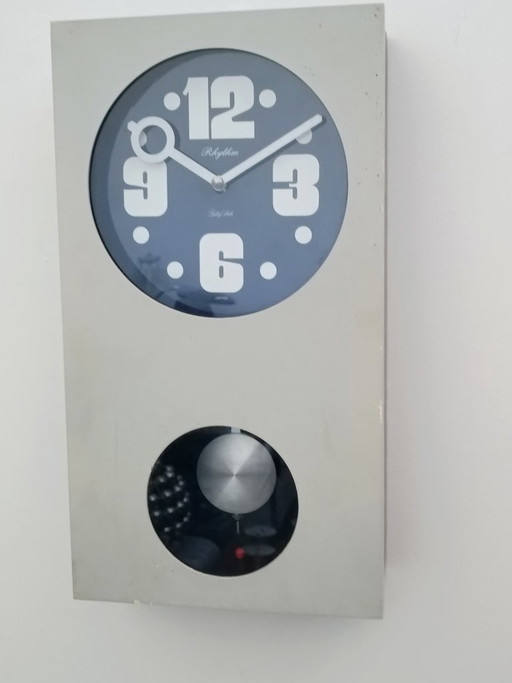 Reloj de péndulo de la era espacial de Rhytm, década de 1970.
