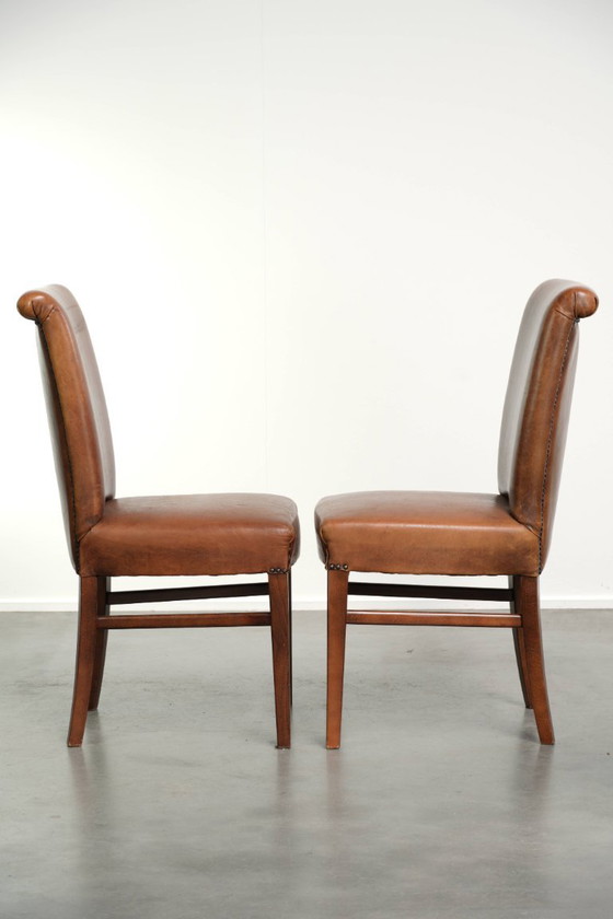 6x Begeerlijke schapenleren eetkamerstoel in een mooie cognac kleur met een mooi patina – Eetkamerstoelen (photo 3 of 17)