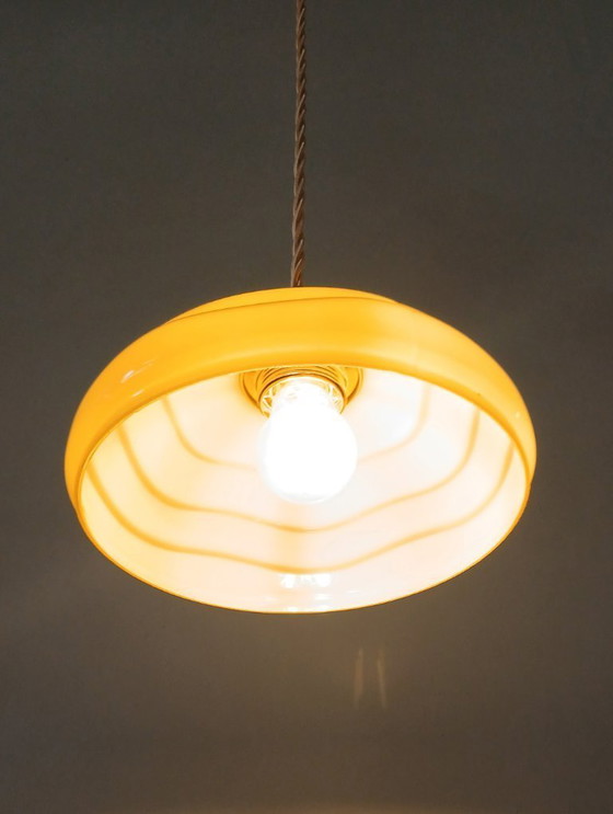 Image 1 of Set (2) Antique ceiling lamps in pastel brown/yellow color.