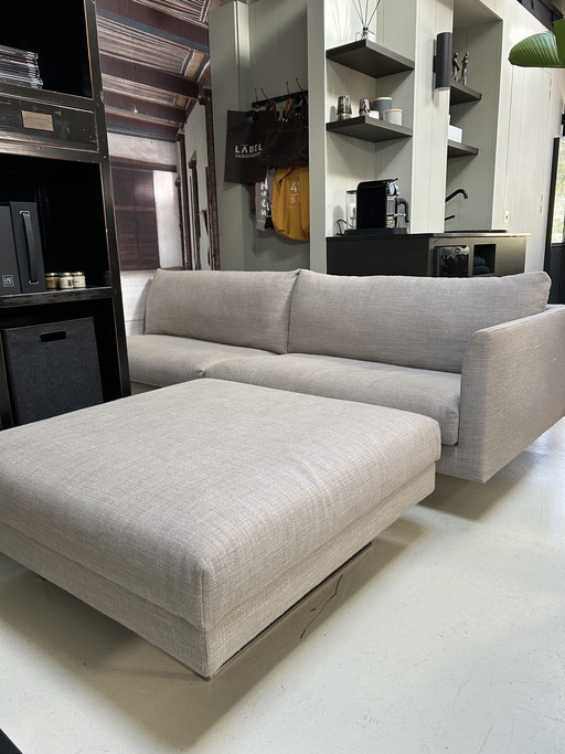 Montis Axel 4-zits bank met 1 armleuning en bijpassende hocker