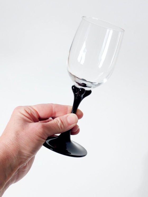 Image 1 of Set di 4 bicchieri da vino Vintage Luminarc Veronese | Vetro trasparente con piedini neri a petali | Francia anni '70