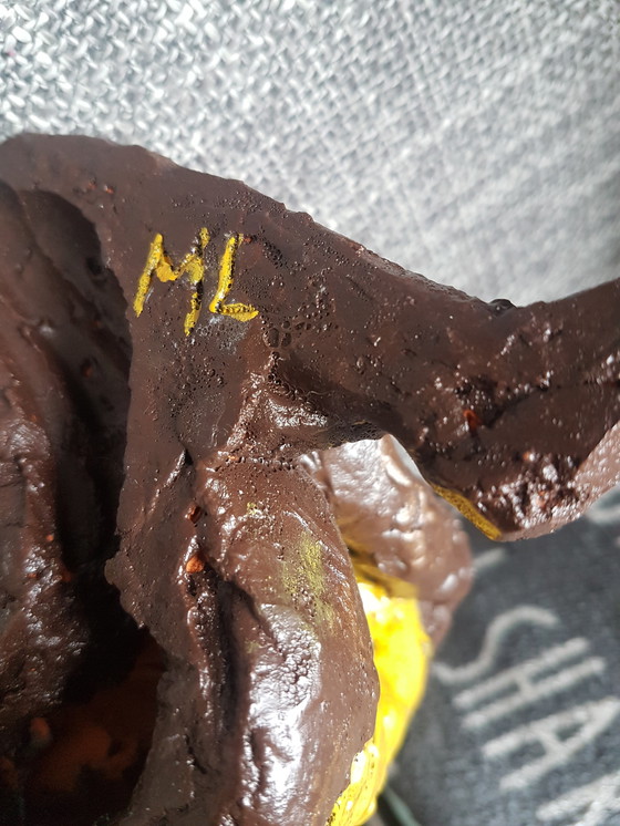 Image 1 of Femme assise en maillot de bain, modelage