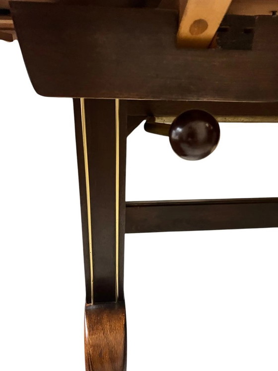 Image 1 of Menzel table/ Spider table, height-adjustable and extendable, made of dark wood with beautiful brass strips, Germany 1960