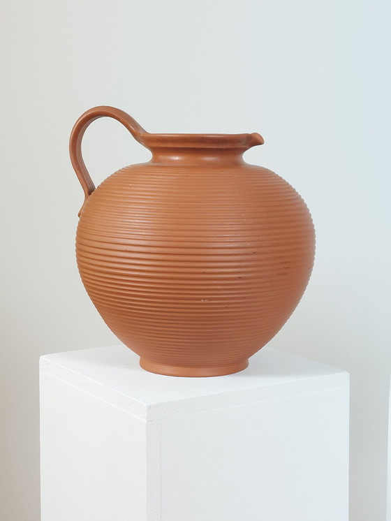 Image 1 of Pair of handmade vintage terracotta handled vases