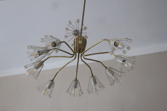 Image 1 of Elliptische kroonluchter met 10 armen van messing en glas, jaren 1950