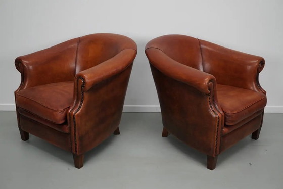 Image 1 of Vintage Nederlandse clubfauteuils in cognackleurig leer, set van 2
