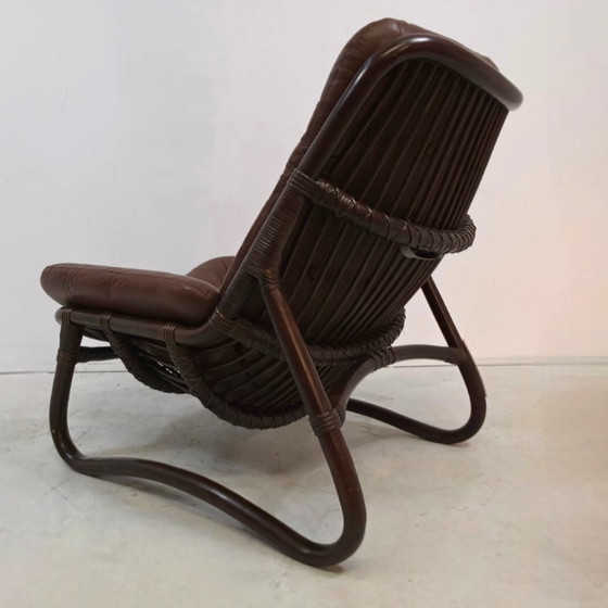 Image 1 of Fauteuil danois en rotin et cuir, années 70, état neuf, milieu du siècle