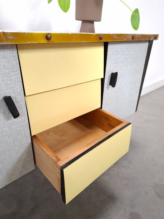 Image 1 of 1950s light blue-yellow cabinet with Formica and slanted legs