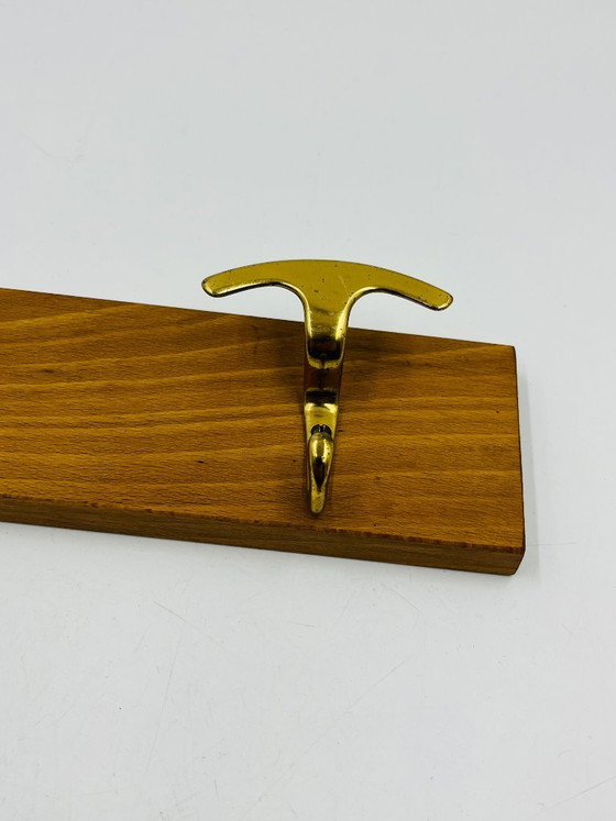 Image 1 of Vintage design wall-mounted coat rack in brass and wood