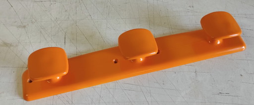 Porte manteaux en plastique orange par Syla - 70's
