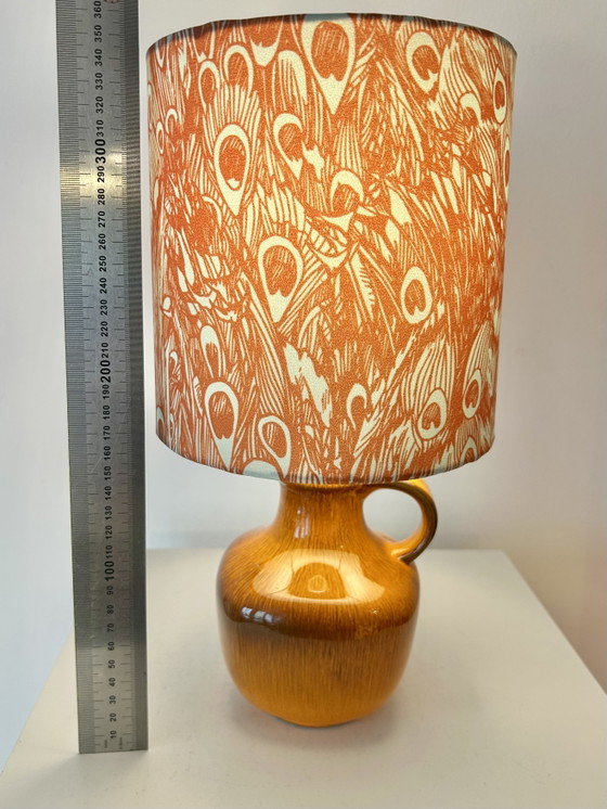Image 1 of Lampada vintage arancione brillante, senza fili, adatta per uso esterno.