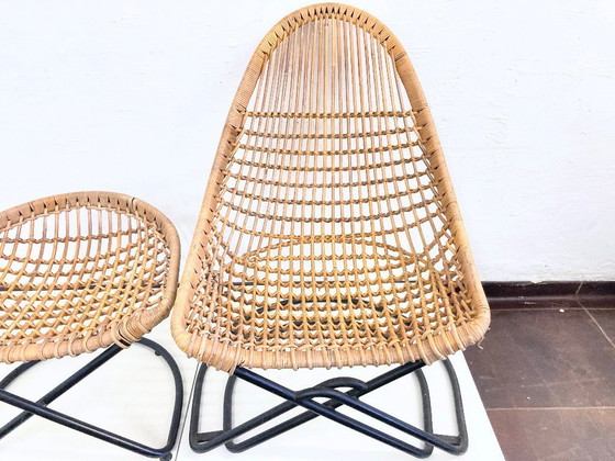 Image 1 of 2 armchairs with stool in rattan 60s design