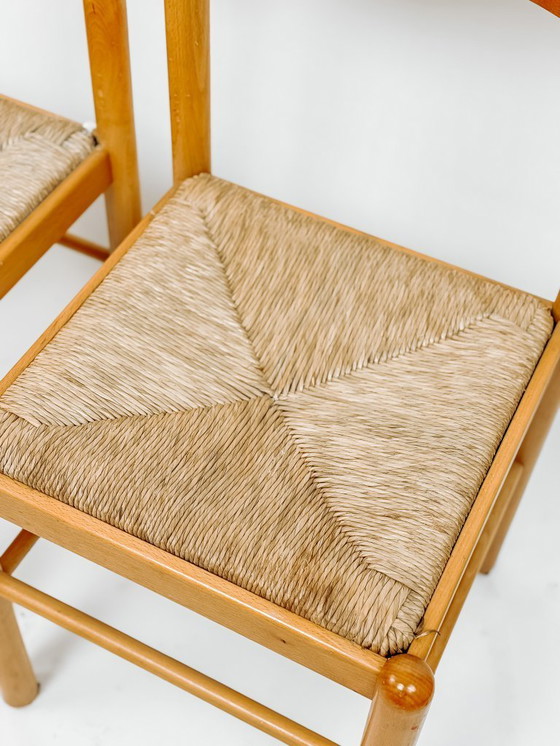 Image 1 of 2x houten Scandinavische eetkamerstoelen met biezen zitting