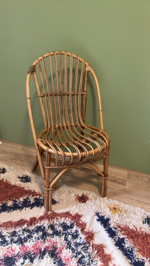 1x Rattan chair by Pierre Hardy