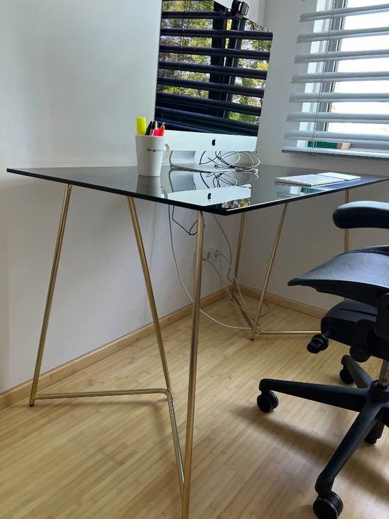Image 1 of MADE  black smokey glass desk with golden metal legs