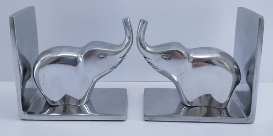 Image 1 of een paar boekensteunen in de vorm van olifanten, gegoten aluminium