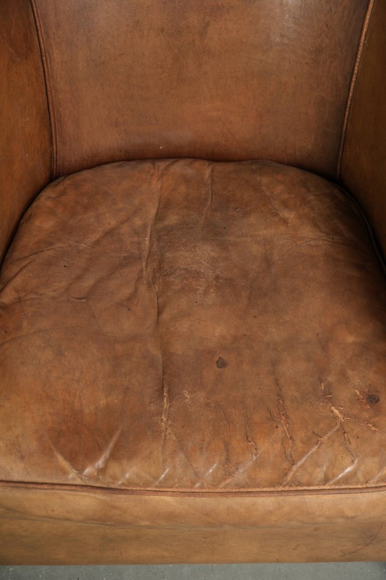 Sturdy Worn Vintage Sheepskin Club Armchair With A Comfortable Seat And A Beautiful Color – Leather (photo 6 of 13)