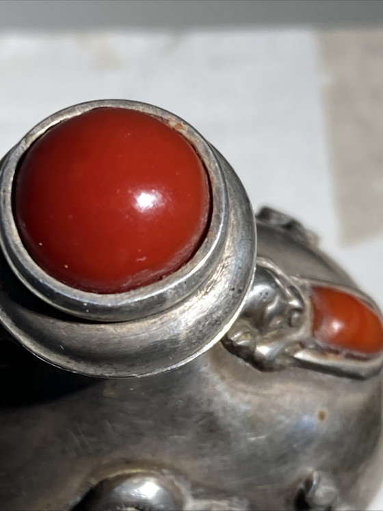 Image 1 of Piccola tabacchiera antica in argento intarsiato con turchese e corallo