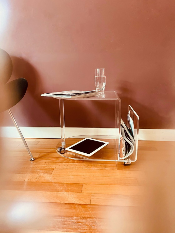 Image 1 of 80's Acrylic side table on wheels + reading material