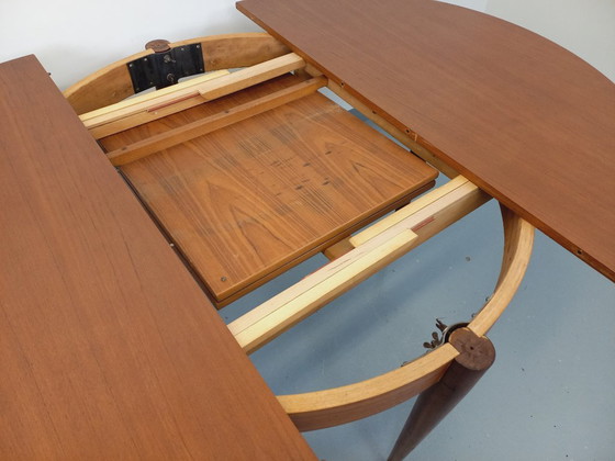 Image 1 of Vintage Scandinavian style round teak dining table from the 1950s/60s with extension