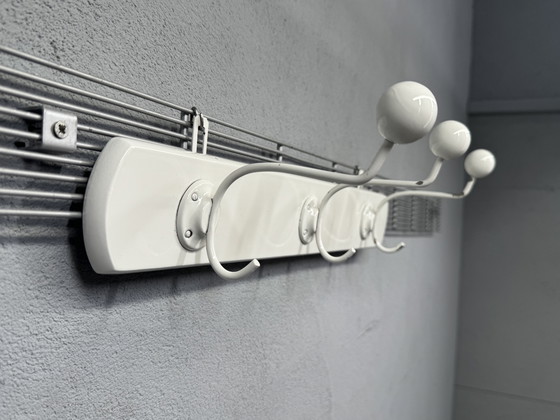 Image 1 of Mid - Century coat rack sleek and timeless design