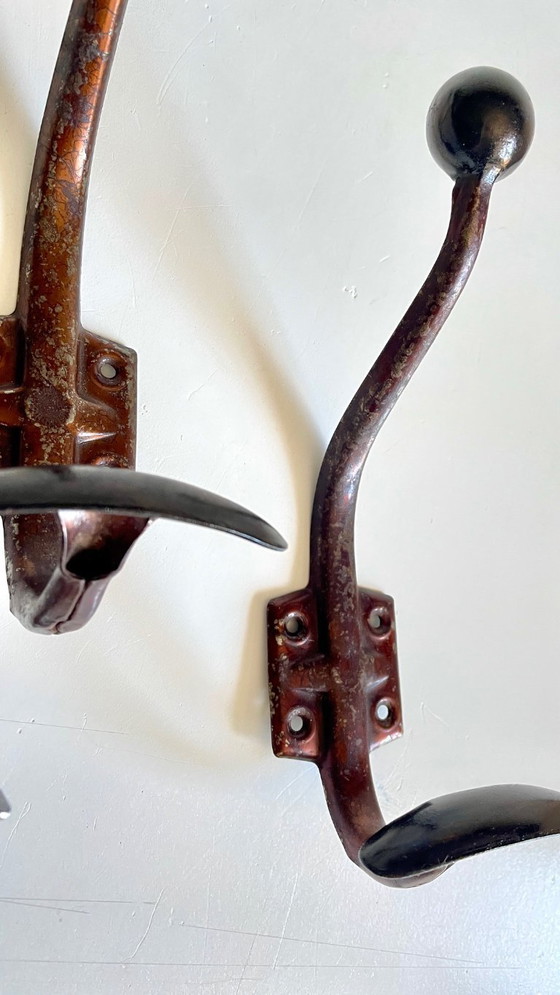 Image 1 of Vintage Patinated Metal Coat Hooks