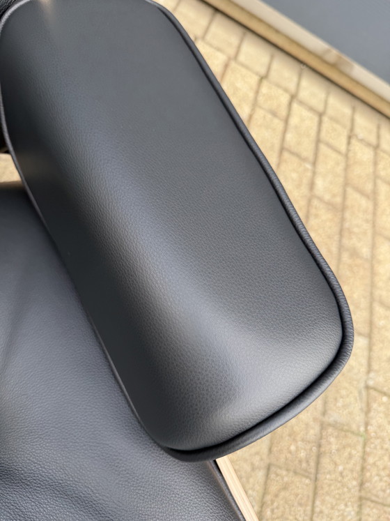 Image 1 of 2 poltrone lounge Vitra Eames XL originali con poggiapiedi, in pregiata pelle nera e palissandro Santos, NUOVE!!