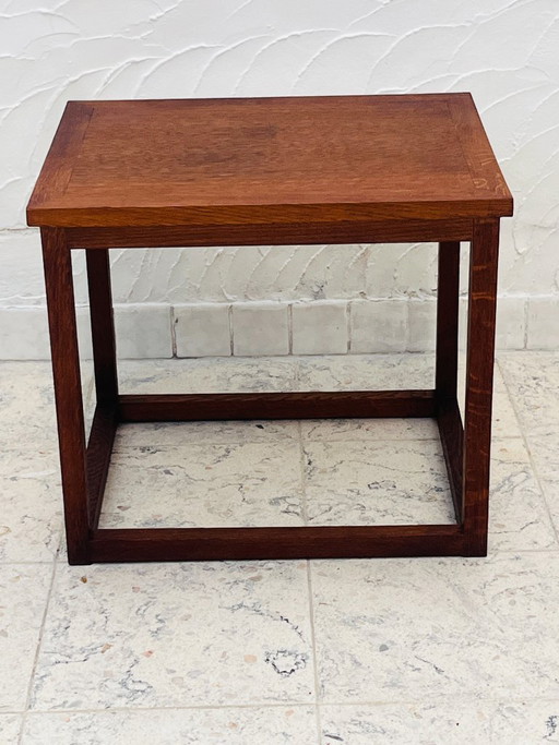 Brutalist side table in solid oak
