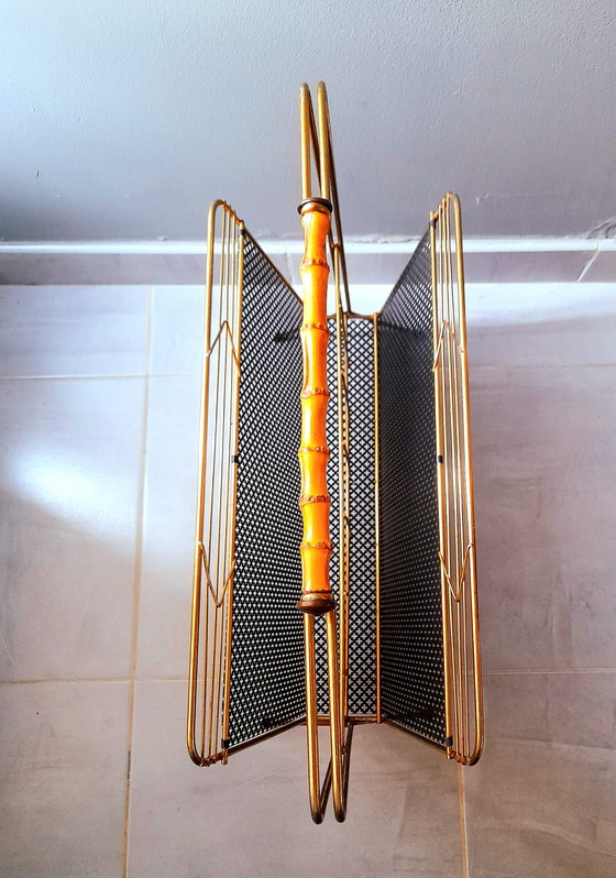 Image 1 of Revistero de metal perforado, 1950.