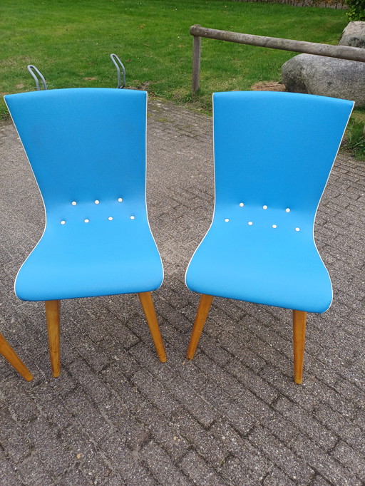 4 G J van Os swing chairs.