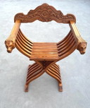 Chaise pliante Savonarola en bois sculpté à têtes de lion – vintage vers 1910-1950