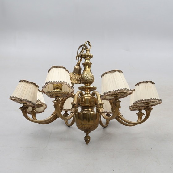 Image 1 of Antique brass chandelier dating from 1920–1930, with eight fittings, dimensions 21 cm wide, 55 cm high and 75 cm deep, in good 