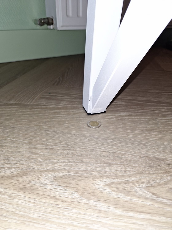 Image 1 of Round white table