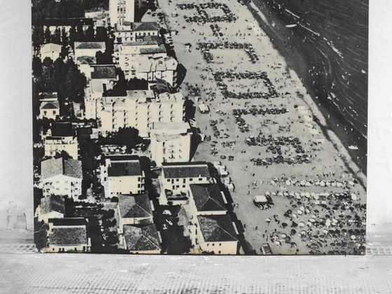 Image 1 of Cocacola umbrellas aerial photography Jesolo beach Italy years '60 by studio Ferruzzi Venice and Marco Lion photographer.