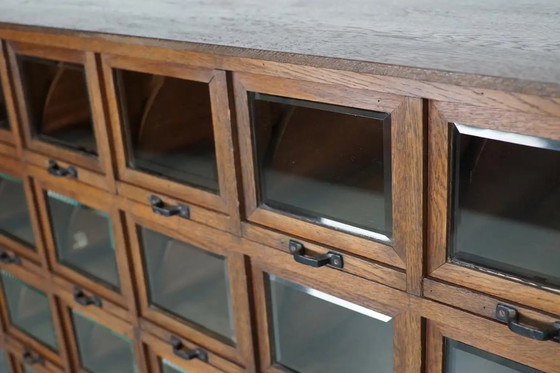 Image 1 of Mobiletto antico tedesco in rovere per merceria, anni '20/'30