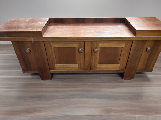 Walnut sideboard designed by Silvio Coppola for Bernini, 1960–1970, expresses the Italian craftsmanship of the period