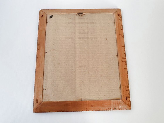 Image 1 of Specchio vintage anni '40-'50 in legno intagliato con motivo a nido d'ape a squame di serpente.