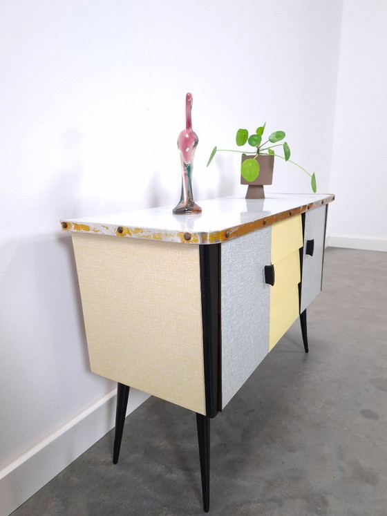 Image 1 of 1950s light blue-yellow cabinet with Formica and slanted legs