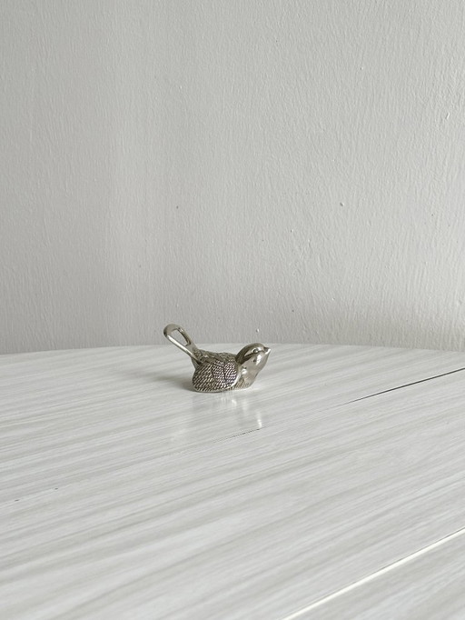 Alter Flaschenöffner aus Metall in Vogelform