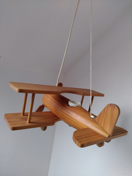 Image 1 of Suspension Avion en bois vintage 
