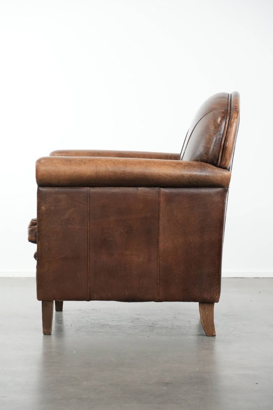 Image 1 of Fauteuil vintage en peau de mouton avec du caractère