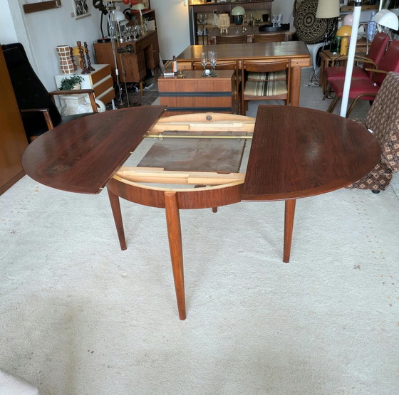 Vintage rosewood round extendable dining table (photo 11 of 11)