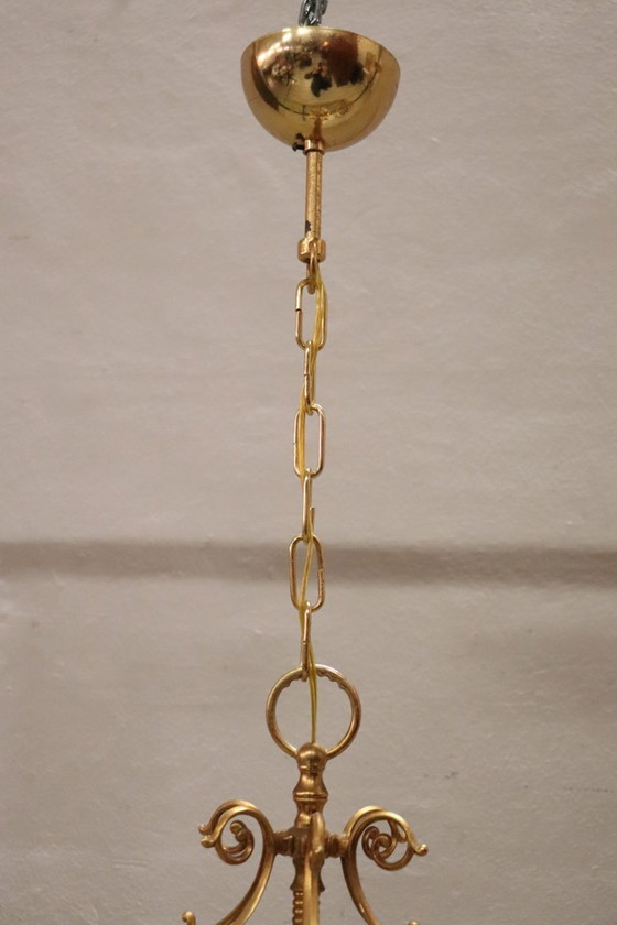 Image 1 of Een paar vintage lantaarns van verguld metaal en glas.