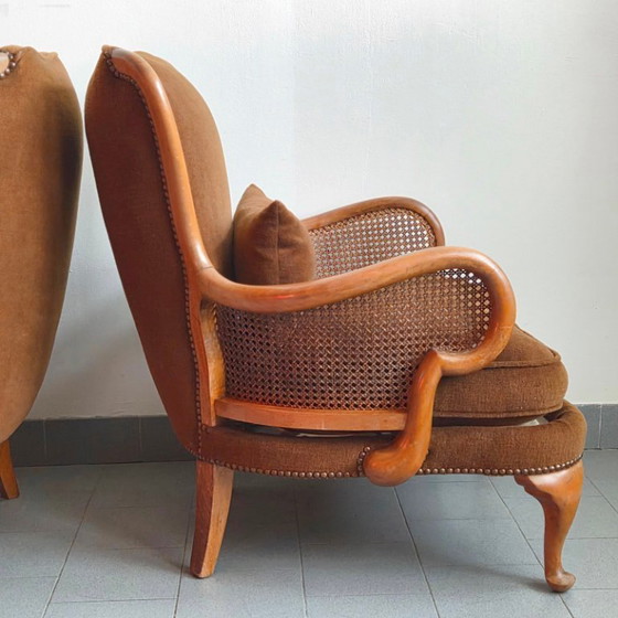 Image 1 of COPPIA DI POLTRONE BERGERE VINTAGE DEI PRIMI DEL XX SECOLO IN RATTAN E LEGNO, SUPERBAMENTE CURVE