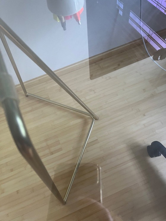 Image 1 of MADE  black smokey glass desk with golden metal legs