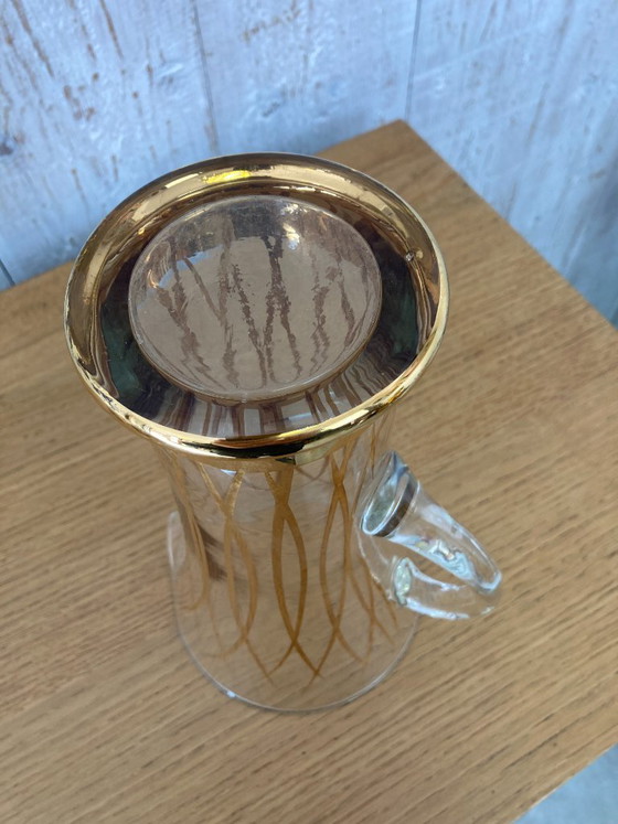 Image 1 of Juego de 6 vasos con jarra a juego.