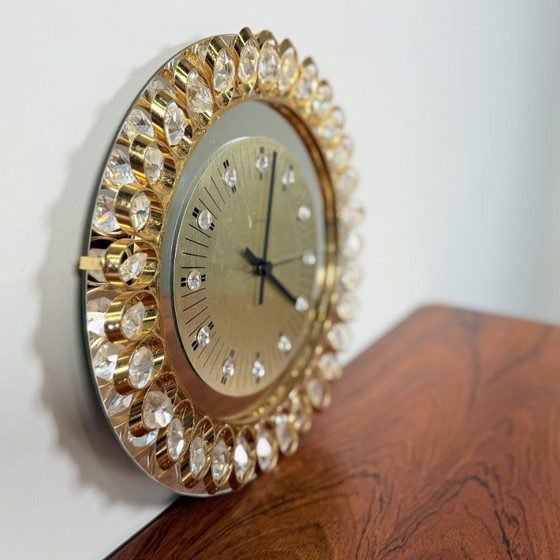 Image 1 of Hollywood regency clock from Junghans, gold and crystal