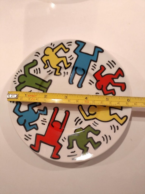 Image 1 of Keith Haring Dinnerware: 3 different sized plates, 1 coffee cup and saucer.