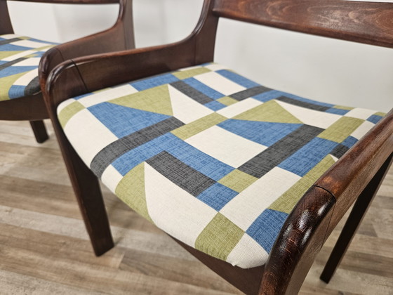 Image 1 of 70s eetkamerstoelen in beukenhout en stoffen uit het ruimte-tijdperk